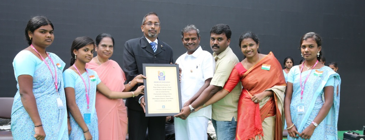 Indian Book of Records Award of Excellence certificate presented to a group during a recognition ceremony